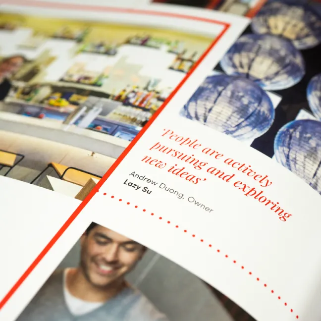 A close up of the Founders Lane brochure with a quote from Andrew Duong, Owner of Lazy Su - 'People are actively pursuing and exploring new ideas'